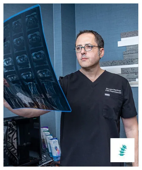Dr. Reyfman scans the patient using a C-Arm X-ray machine for Pain Management