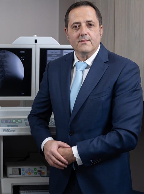 Dr. Reyfman diagnosing spine issues