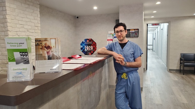 Dr. Dmitriy Dvoskin, MD at the front desk